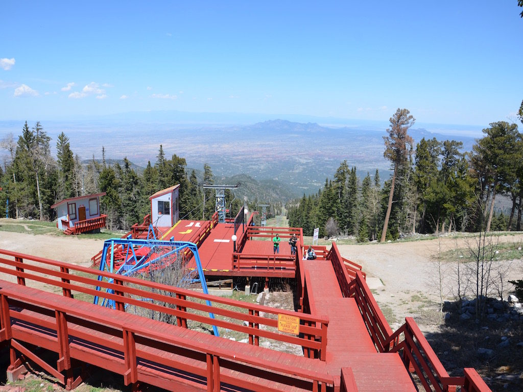 The ski run on the other side of the peak.