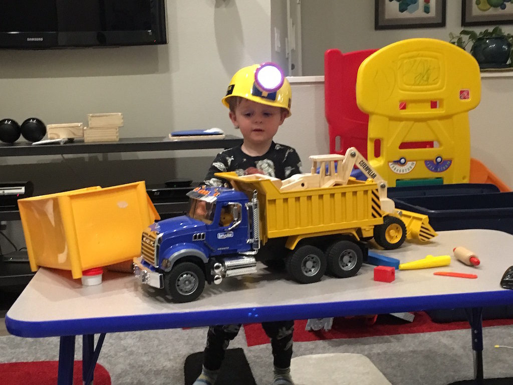 Reeve hard at work sporting his new miners hardhat we got him in Bisbee at the copper mine.