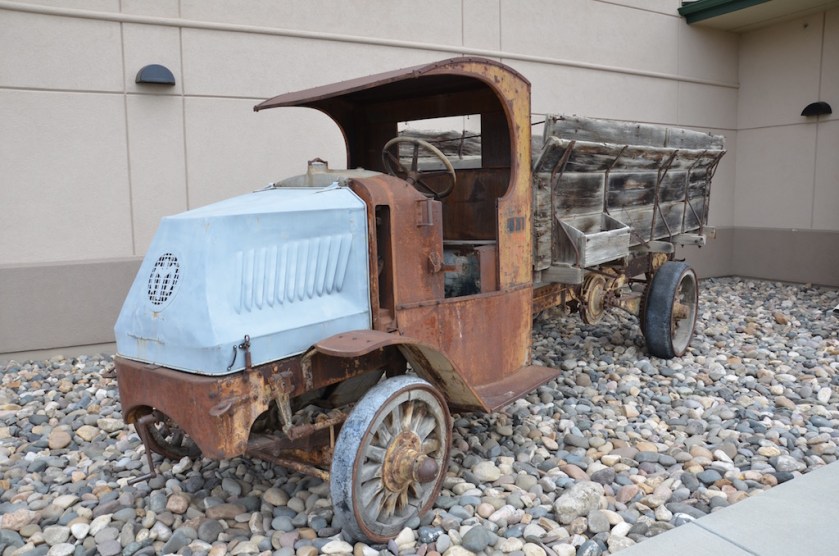 The truck out from; it looks like they were going to restore it but quit at the hood!