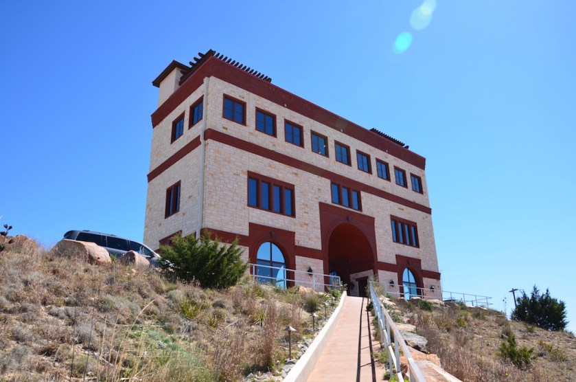 View from the parking lot. Wine tasting on the ground floor and top deck with vacation suite rentals on the second and third floors. The third floor is one unit!